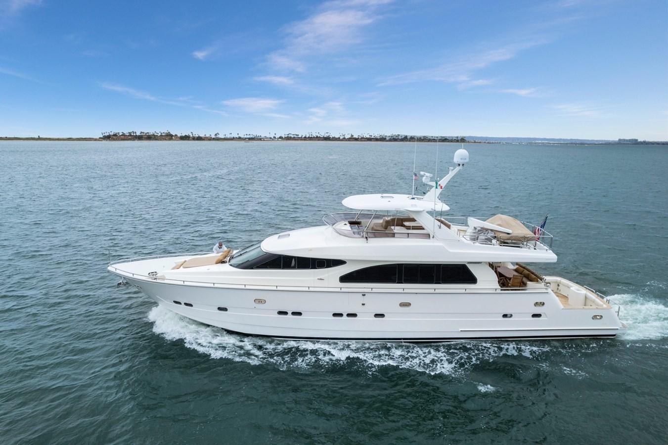 a white yacht in the water aboard VAMOS A VER Yacht for Sale