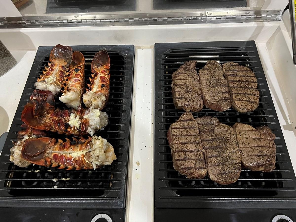 meat on a grill aboard VAMOS A VER Yacht for Sale