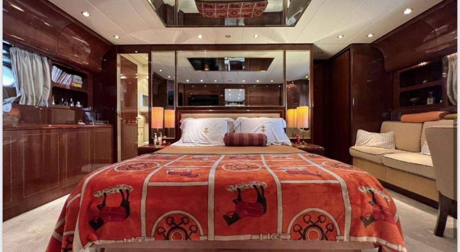 a bed in a room aboard DG Yacht for Sale