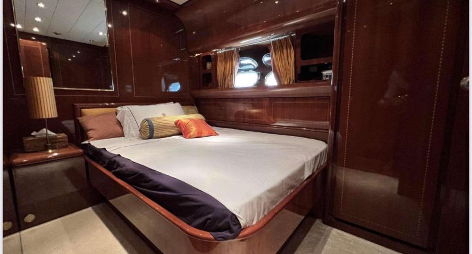 a bed in a cabin aboard DG Yacht for Sale