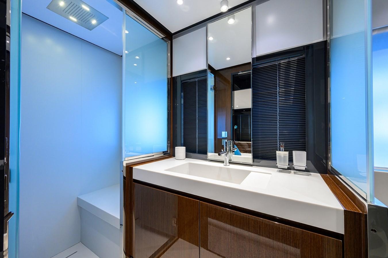 a bathroom with a sink and cabinets aboard JACQPOT Yacht for Sale
