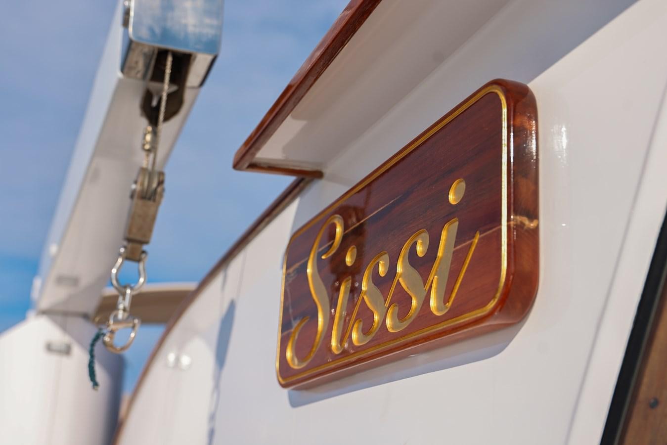 a sign on a white wall aboard SISSI Yacht for Sale