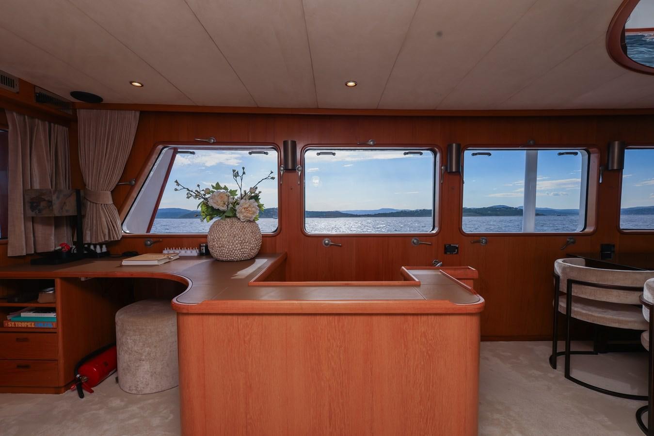 a room with a desk and a window aboard SISSI Yacht for Sale
