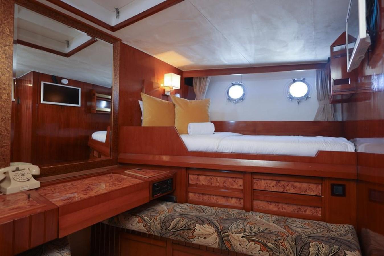 a room with two beds aboard SISSI Yacht for Sale