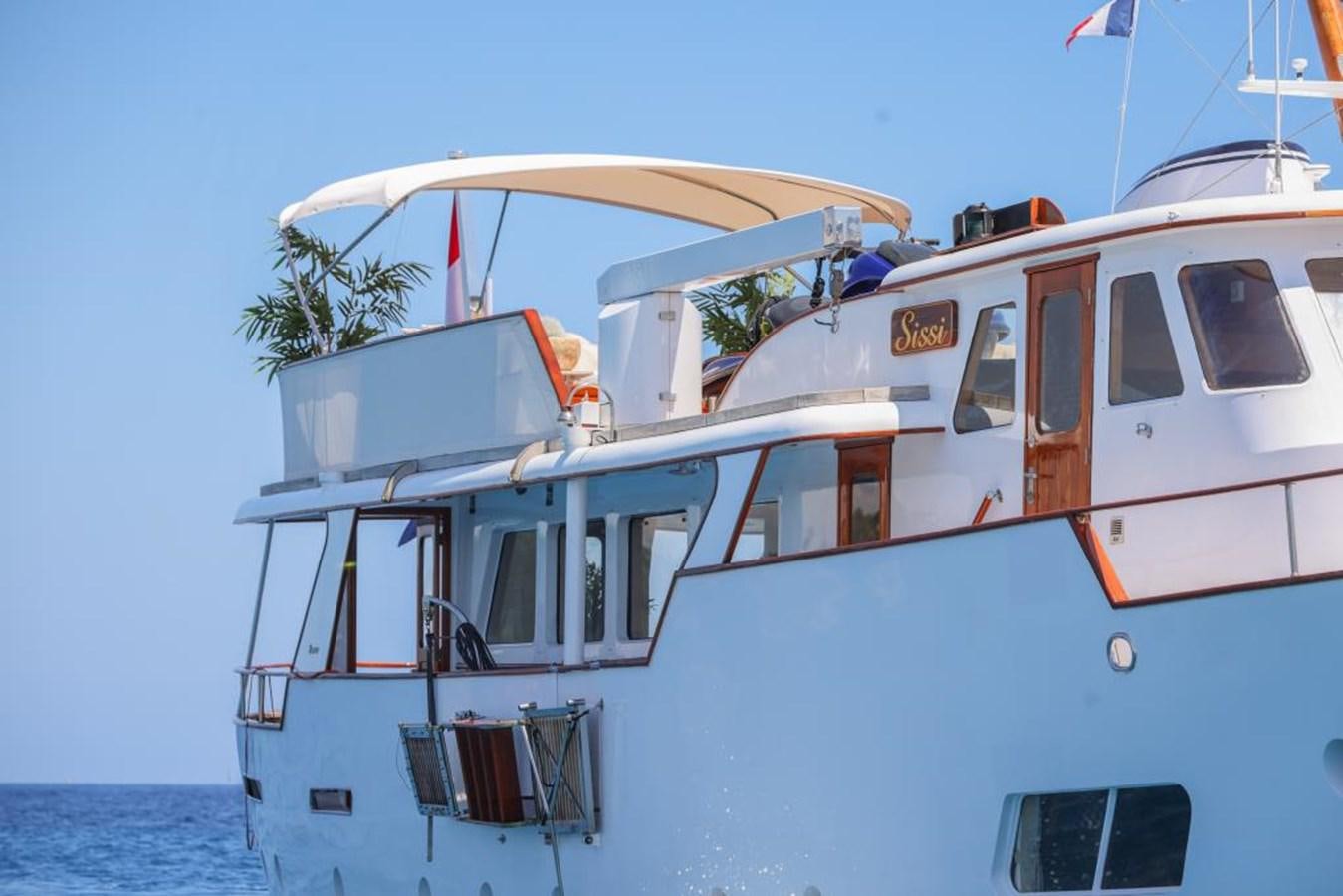 a boat with a canopy aboard SISSI Yacht for Sale