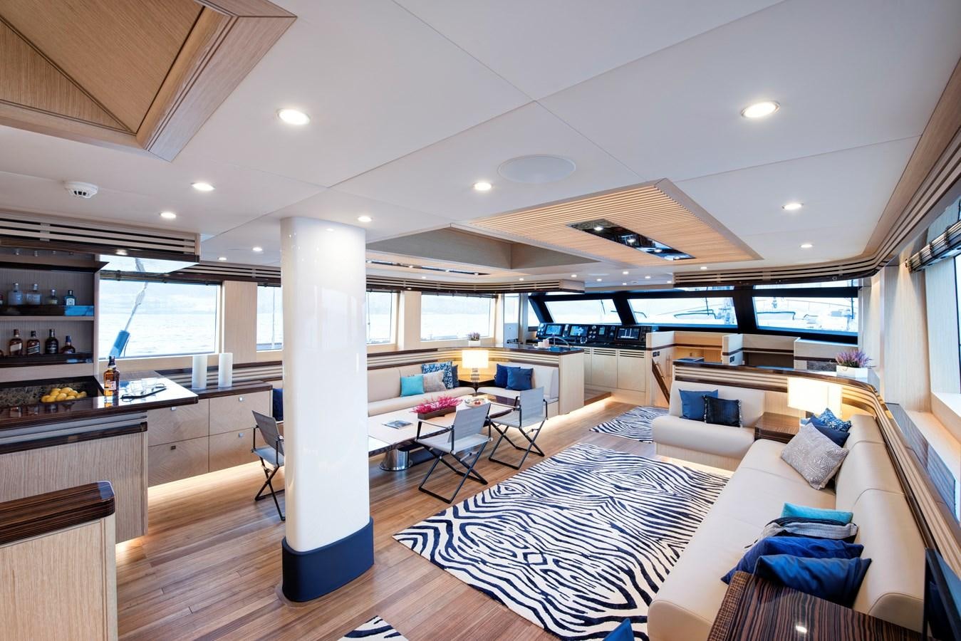 a large room with a large white column and a large white pillar aboard THAT'S AMORE Yacht for Sale