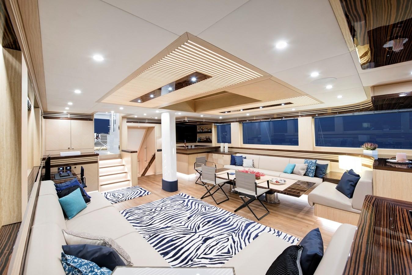 a large room with a bed and a large window aboard THAT'S AMORE Yacht for Sale