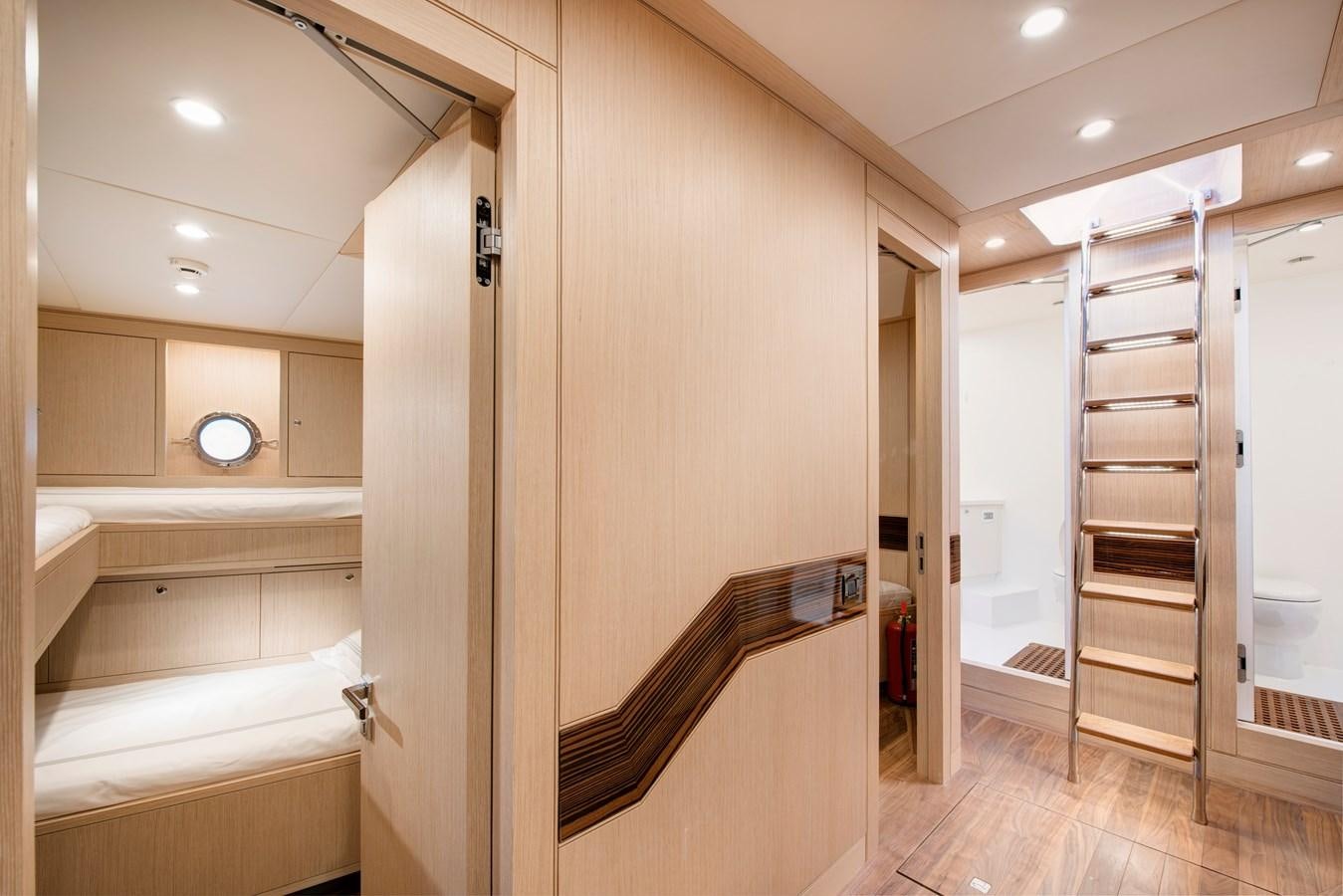 a room with a closet and a staircase aboard THAT'S AMORE Yacht for Sale