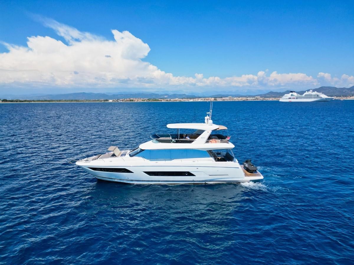 a white boat in the water aboard ENDLESS SUMMER II Yacht for Sale