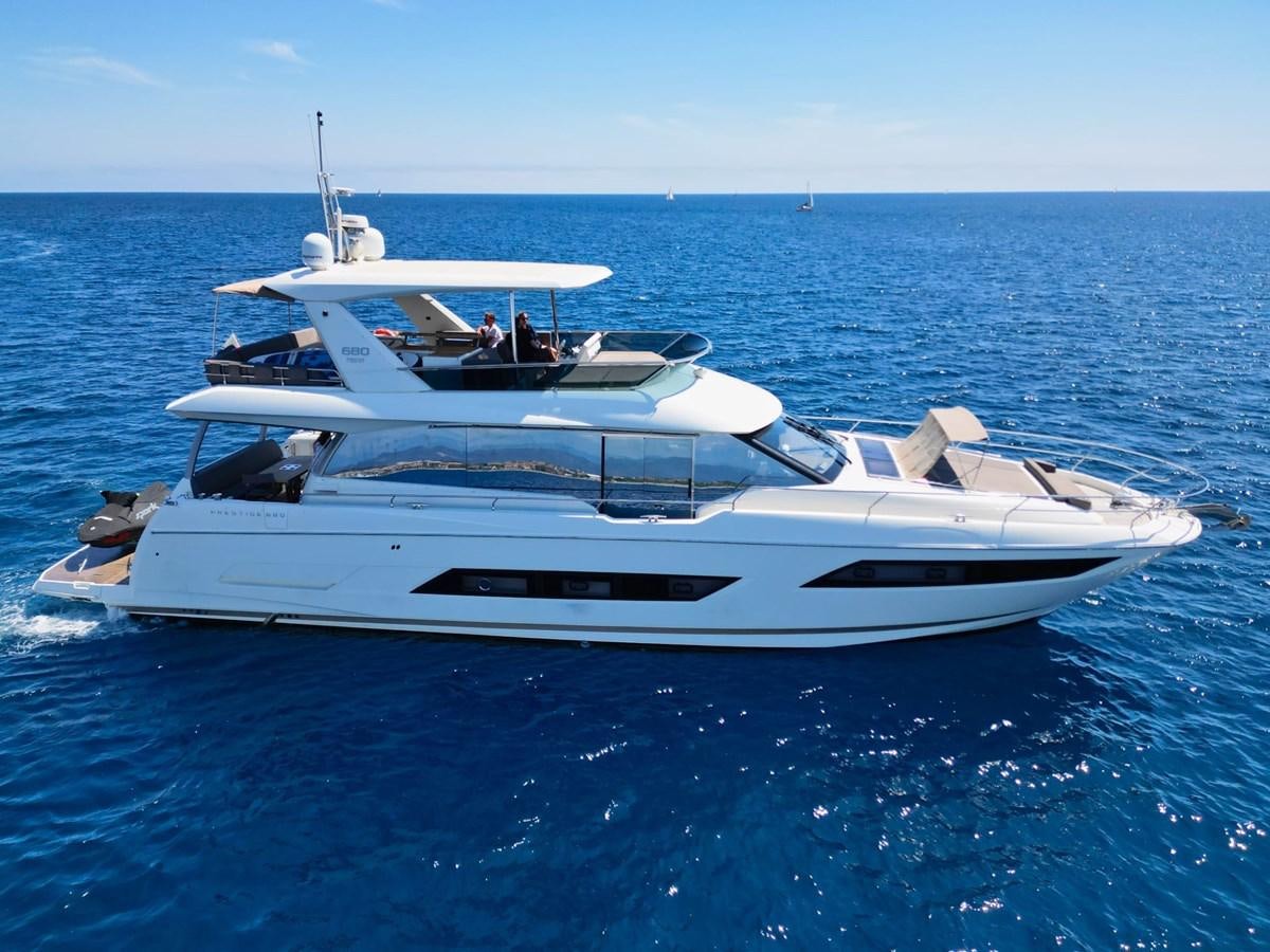 a white yacht on the water aboard ENDLESS SUMMER II Yacht for Sale