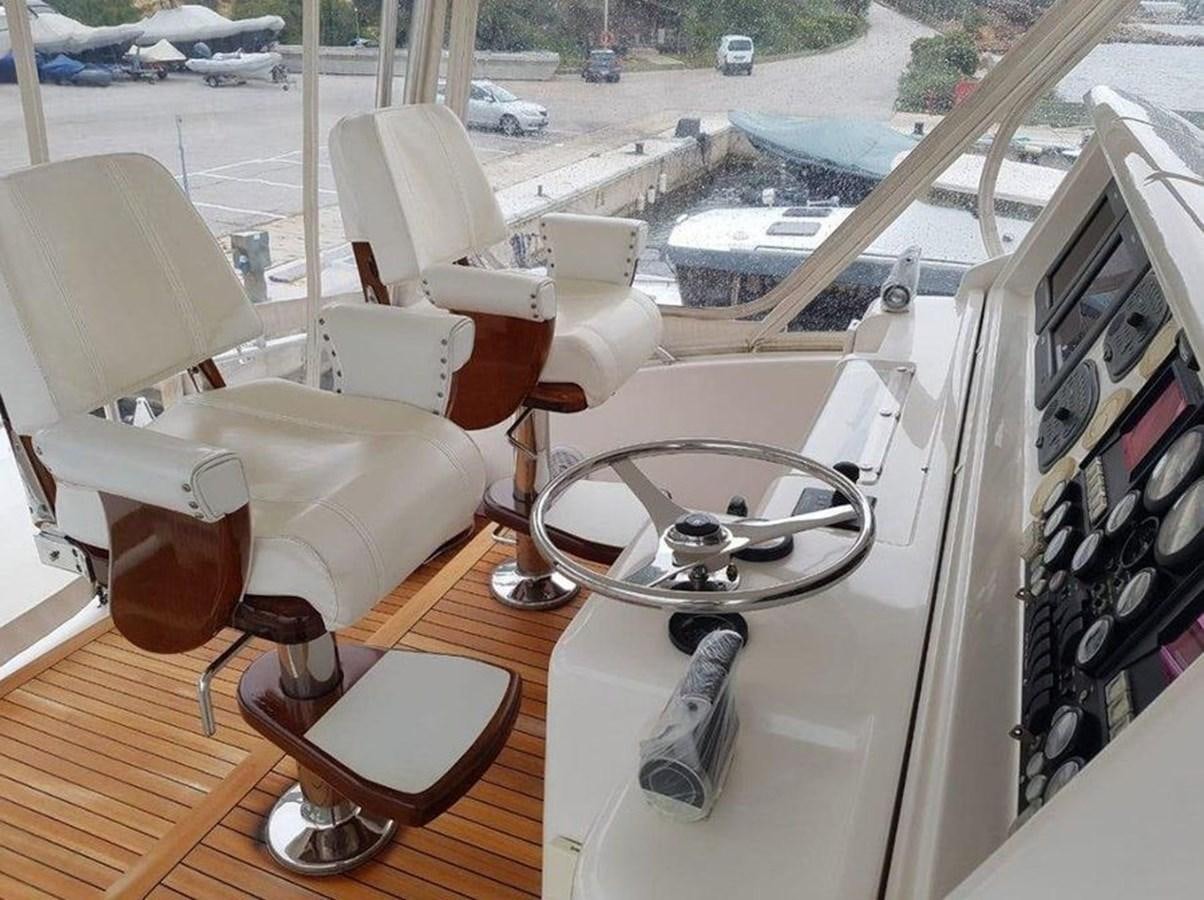 a car with a seat open aboard BOUKI Yacht for Sale