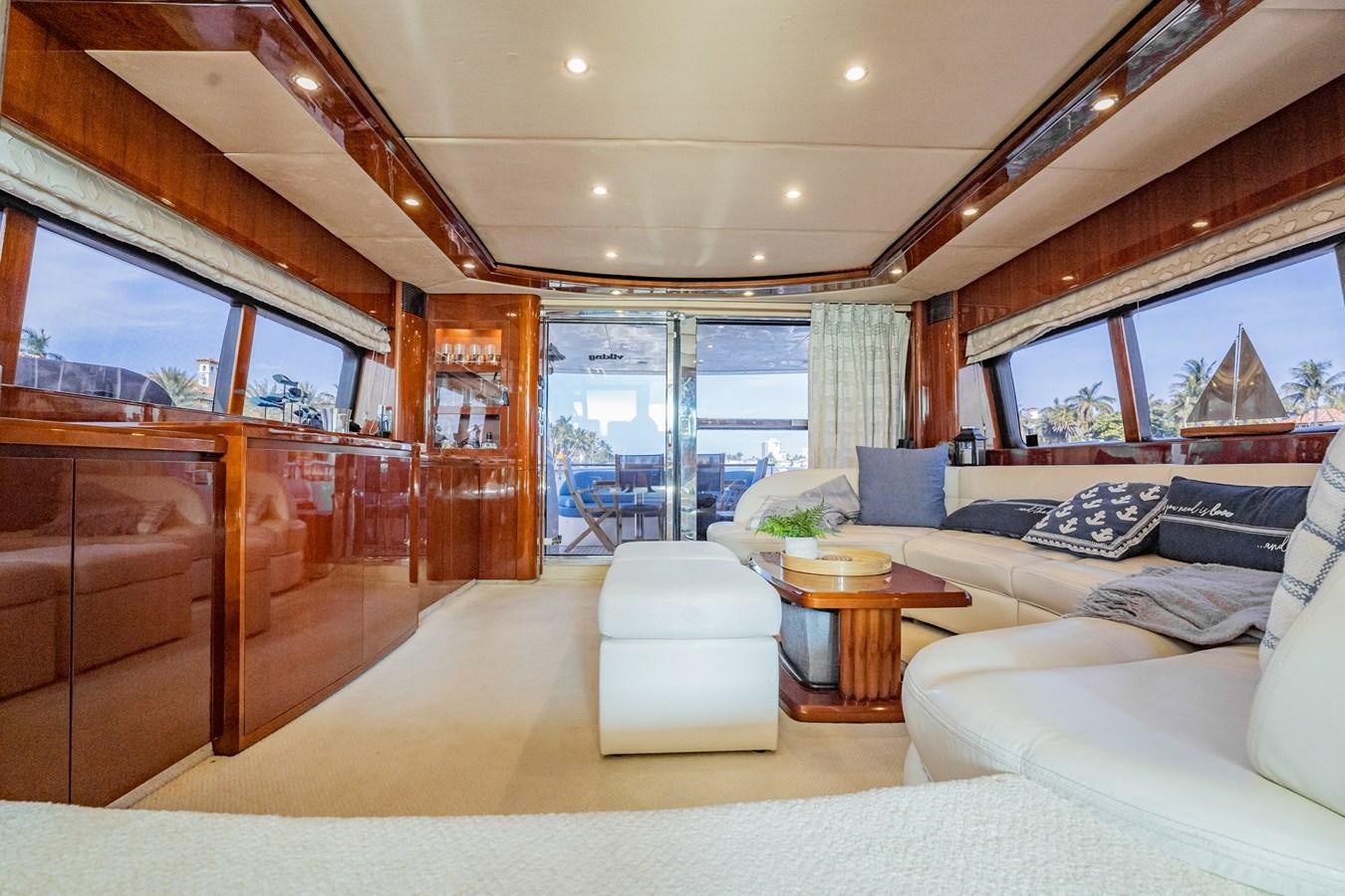 a living room with a large window aboard HALF MINE Yacht for Sale