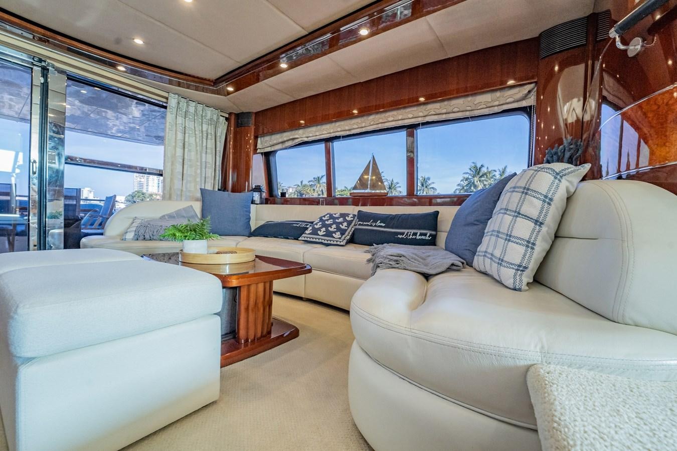 a living room with a large window aboard HALF MINE Yacht for Sale