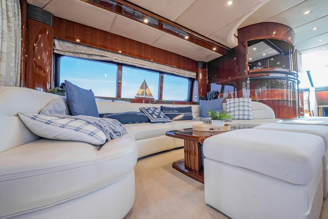 a living room with a large window aboard HALF MINE Yacht for Sale