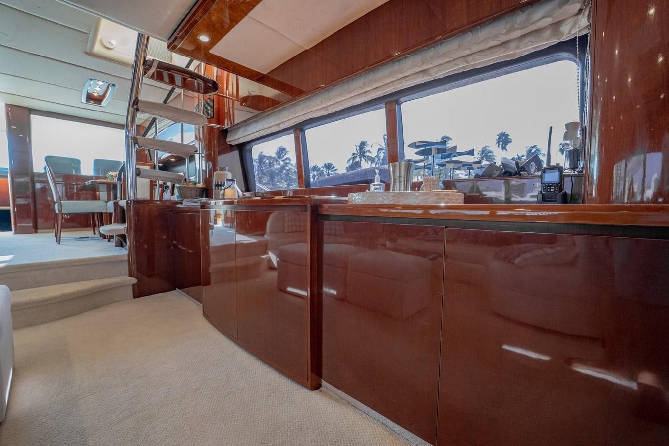 a room with a desk and chairs aboard HALF MINE Yacht for Sale
