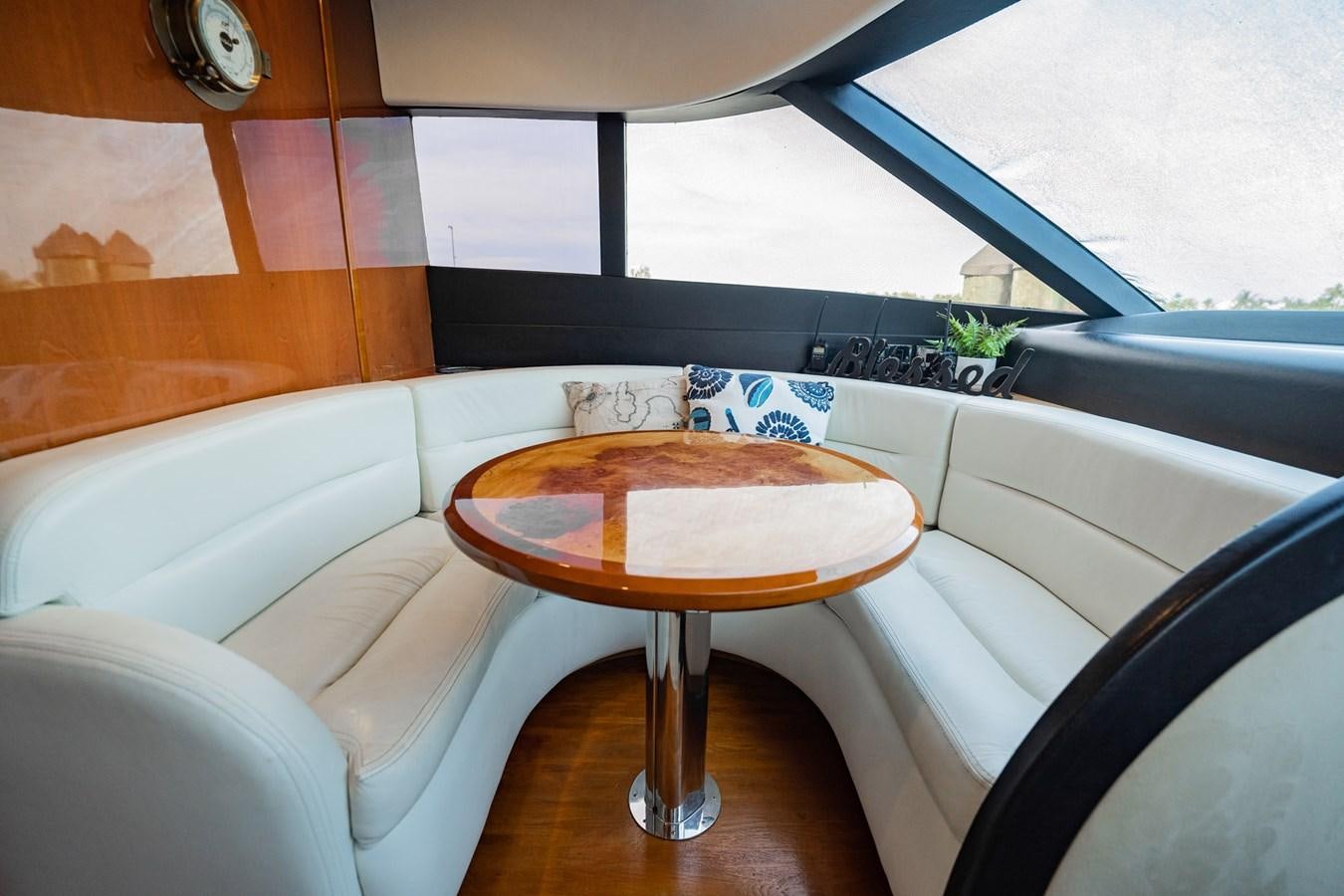 a coffee table on a boat aboard HALF MINE Yacht for Sale