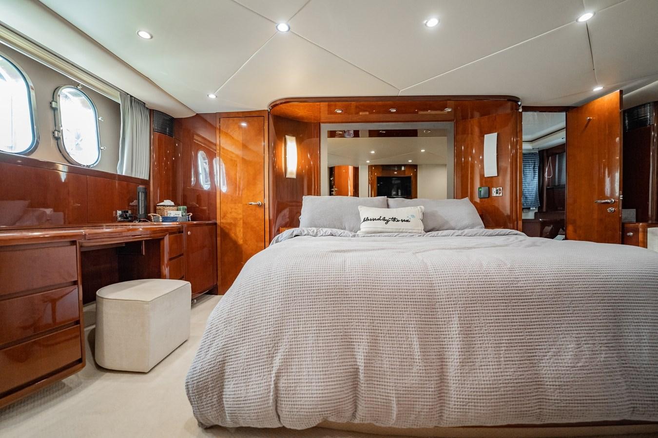 a bed in a room aboard HALF MINE Yacht for Sale