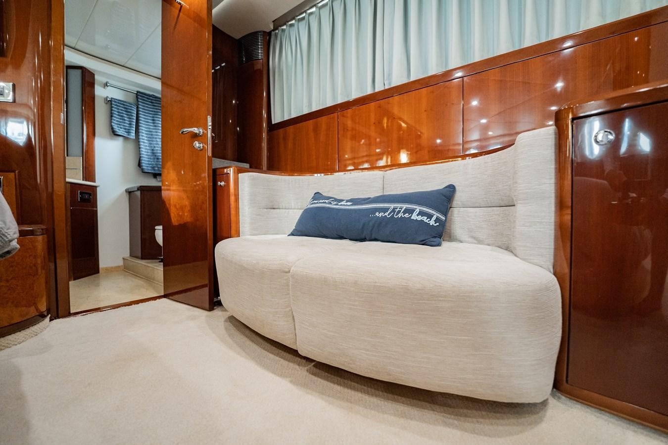 a bed with a white sheet aboard HALF MINE Yacht for Sale
