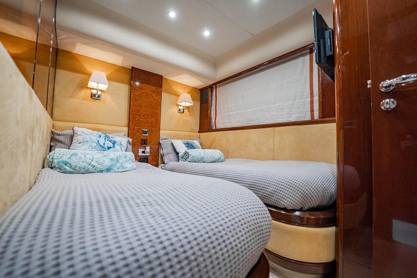 a couple of beds in a room aboard HALF MINE Yacht for Sale