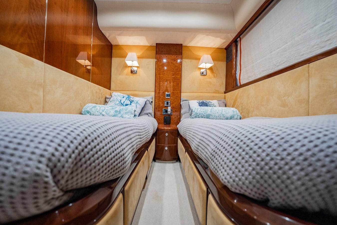 a couple of beds in a room aboard HALF MINE Yacht for Sale