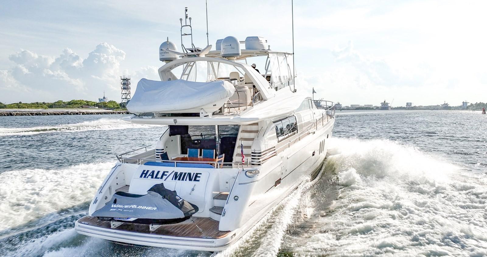 a boat on the water aboard HALF MINE Yacht for Sale
