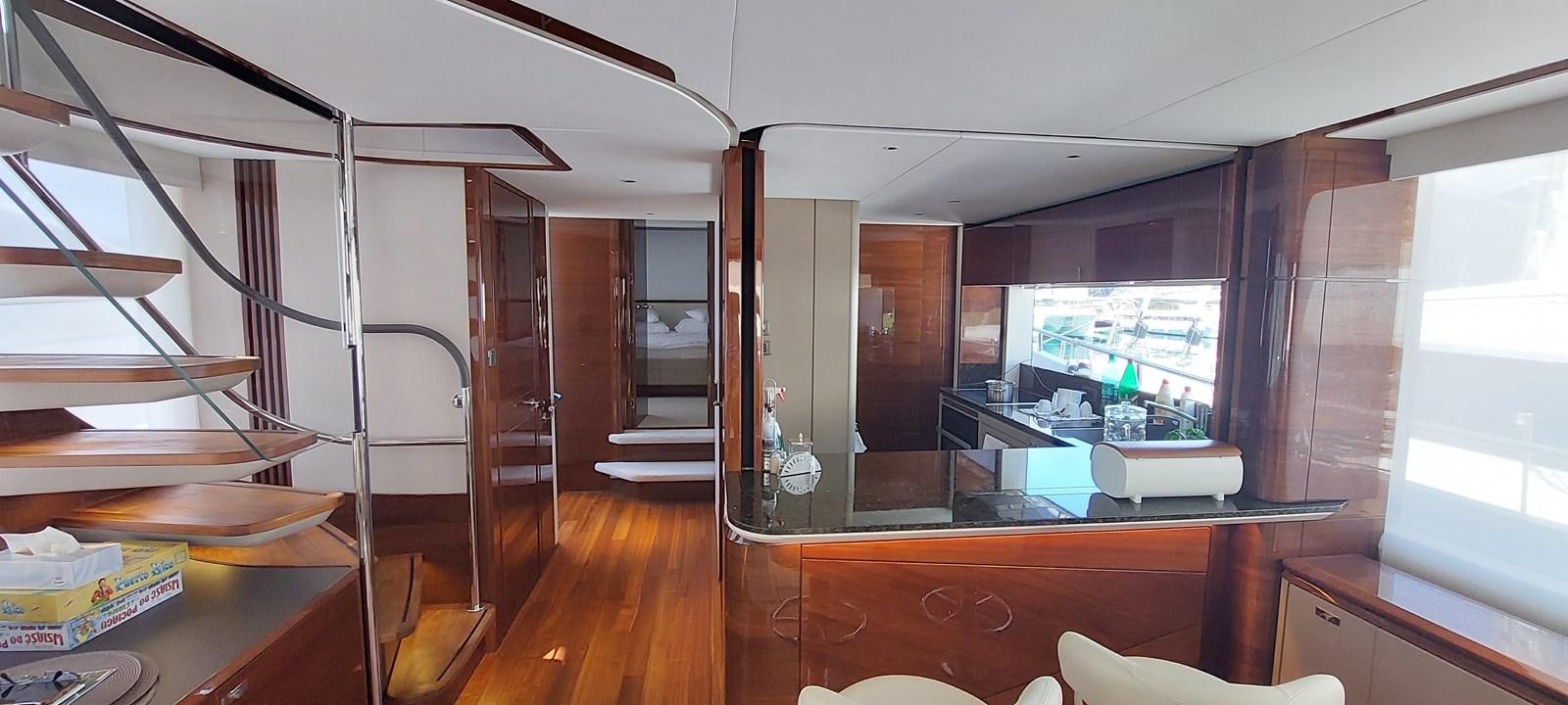 a room with a ladder and a desk aboard PERLA Yacht for Sale