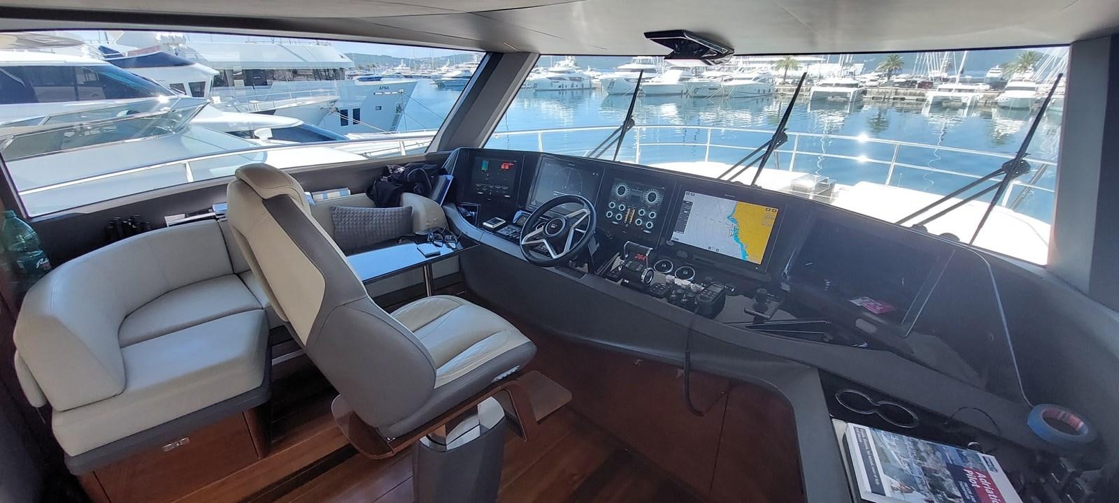 inside of a car aboard PERLA Yacht for Sale