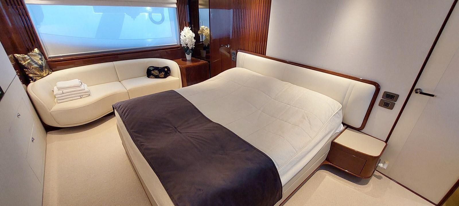 a room with a couple beds aboard PERLA Yacht for Sale