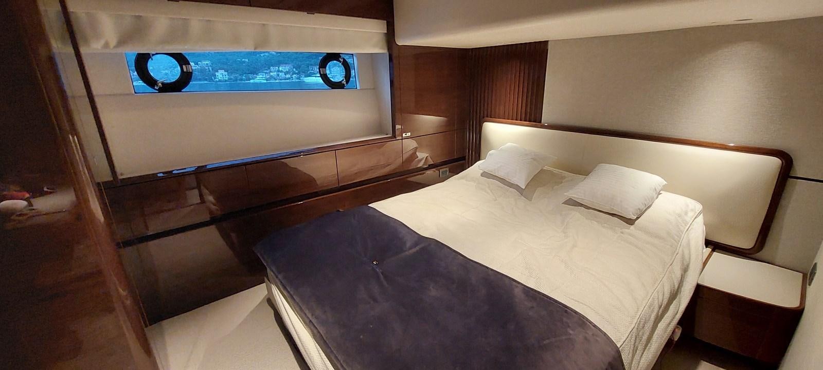 a bed in a room aboard PERLA Yacht for Sale