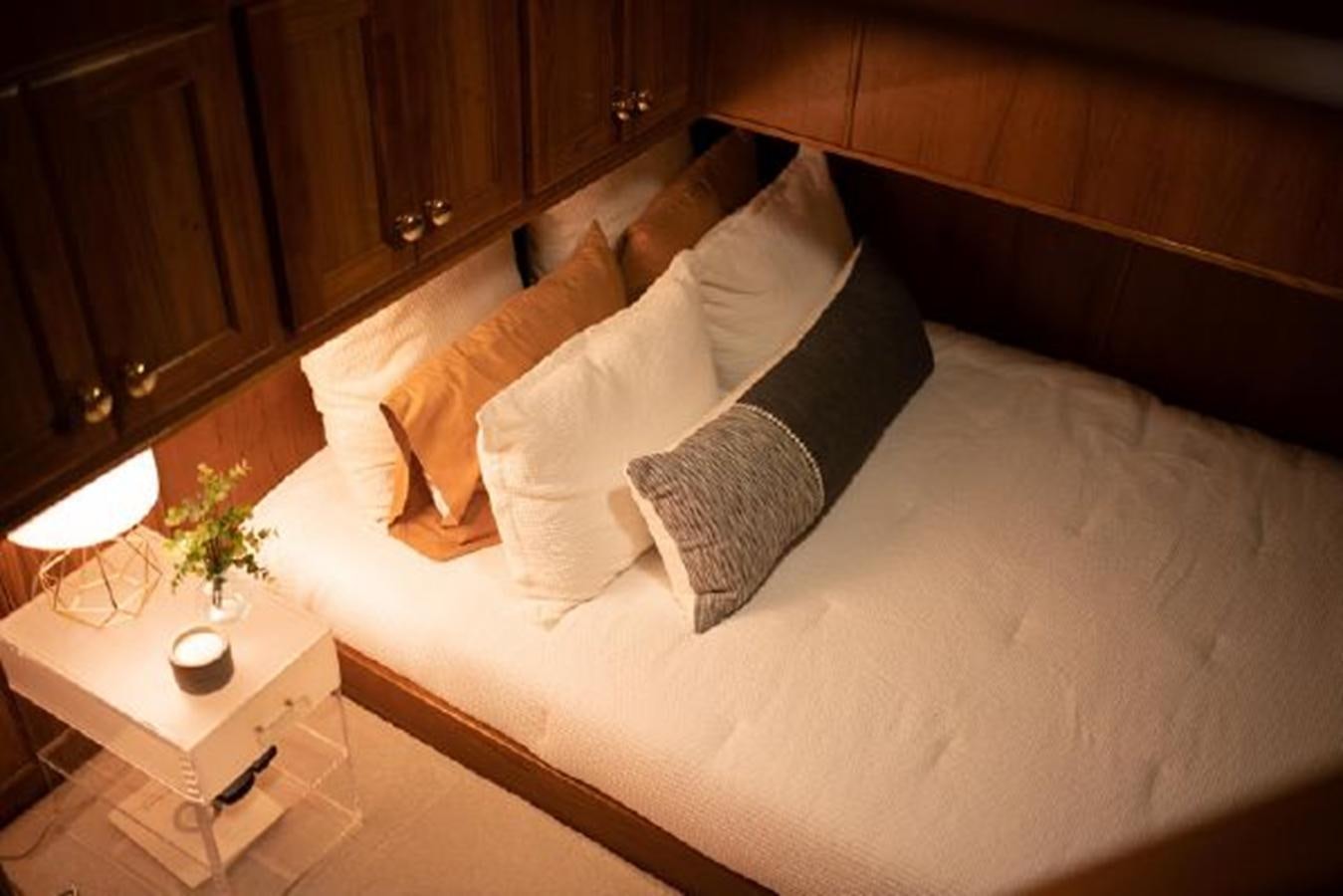 a bed with pillows aboard 88 LAZY DAYS BEACHEM Yacht for Sale