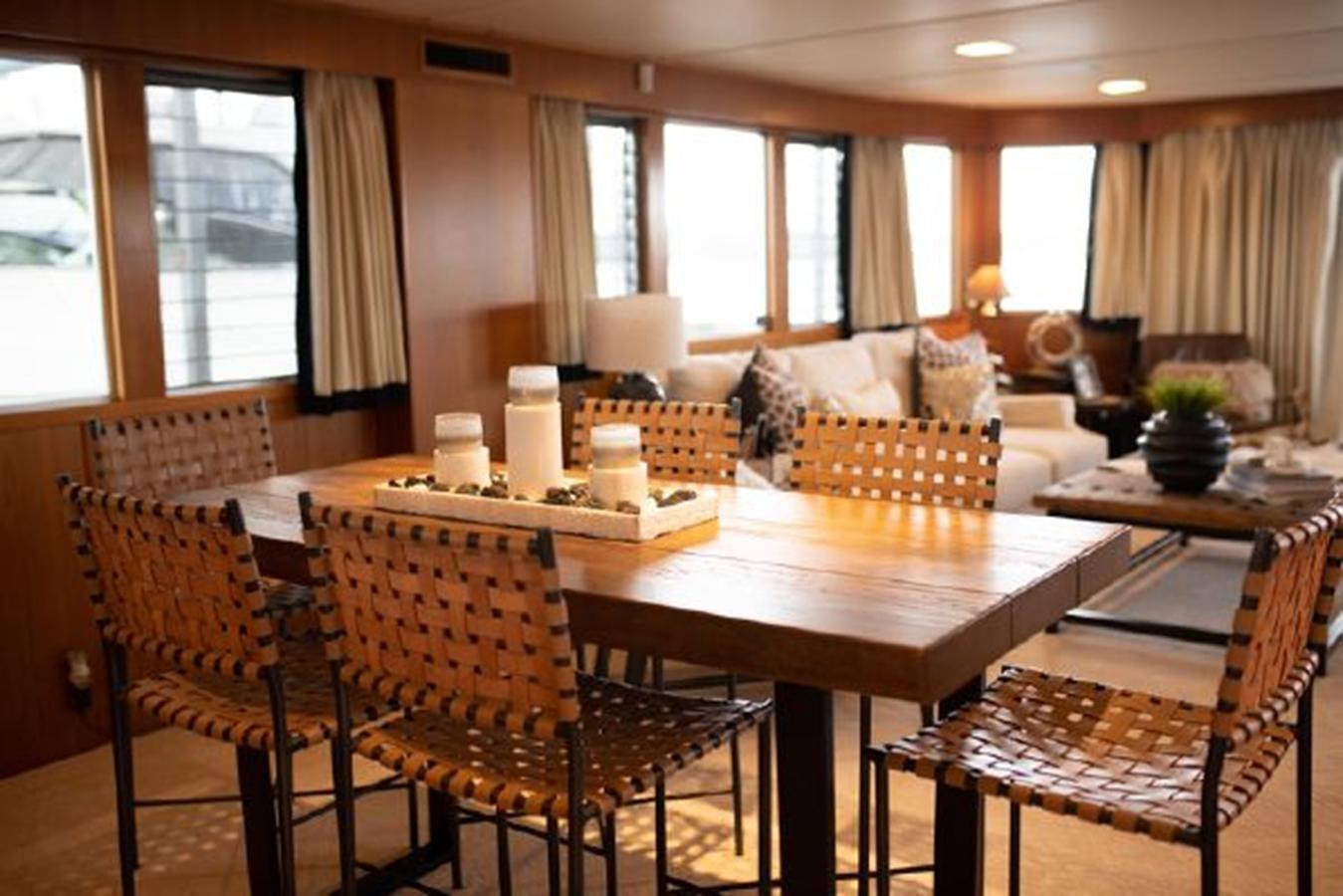 a dining room with a table and chairs aboard 88 LAZY DAYS BEACHEM Yacht for Sale
