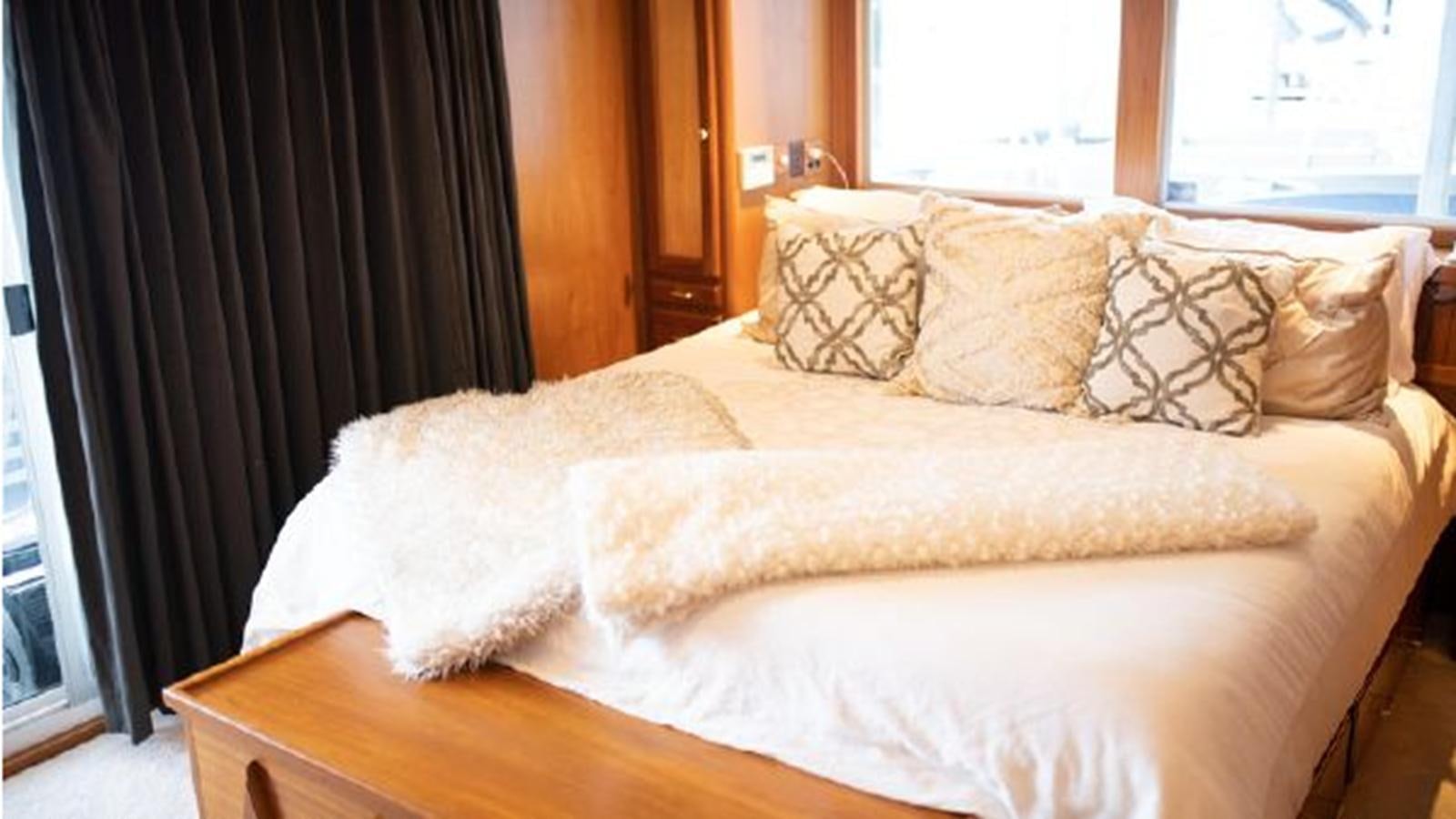 a couch with pillows aboard 88 LAZY DAYS BEACHEM Yacht for Sale