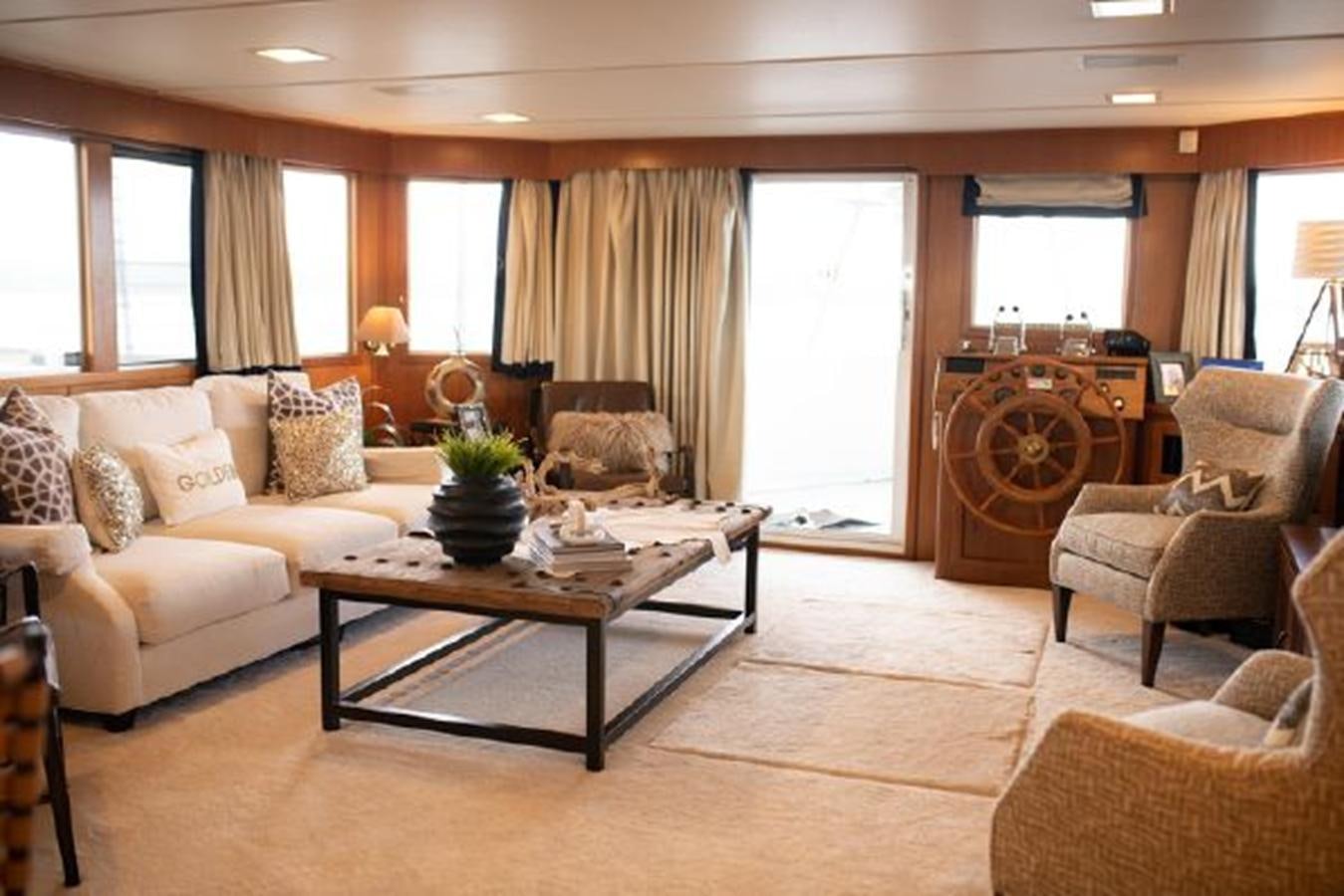 a living room with a large window aboard 88 LAZY DAYS BEACHEM Yacht for Sale