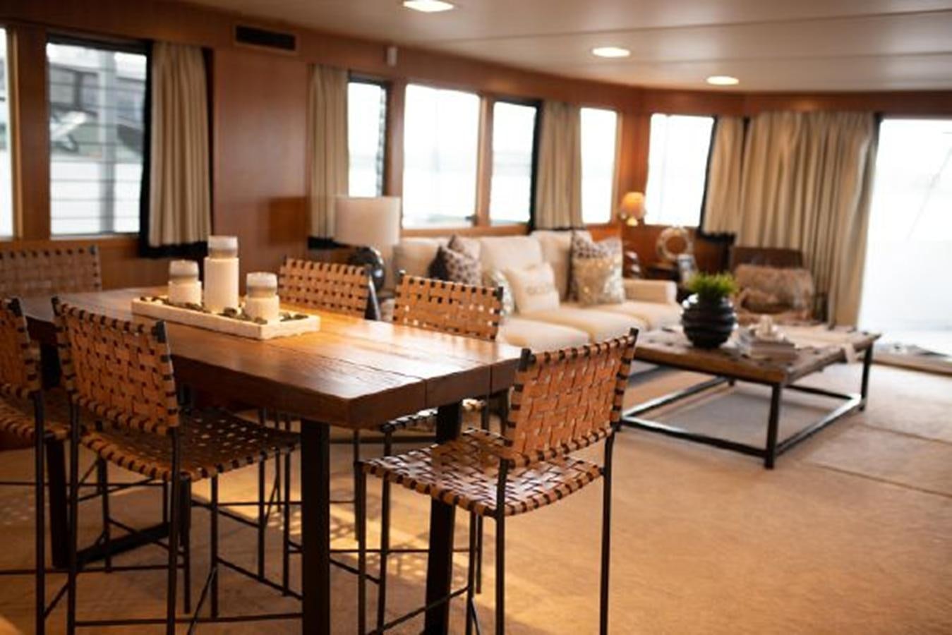 a living room with a table and chairs aboard 88 LAZY DAYS BEACHEM Yacht for Sale