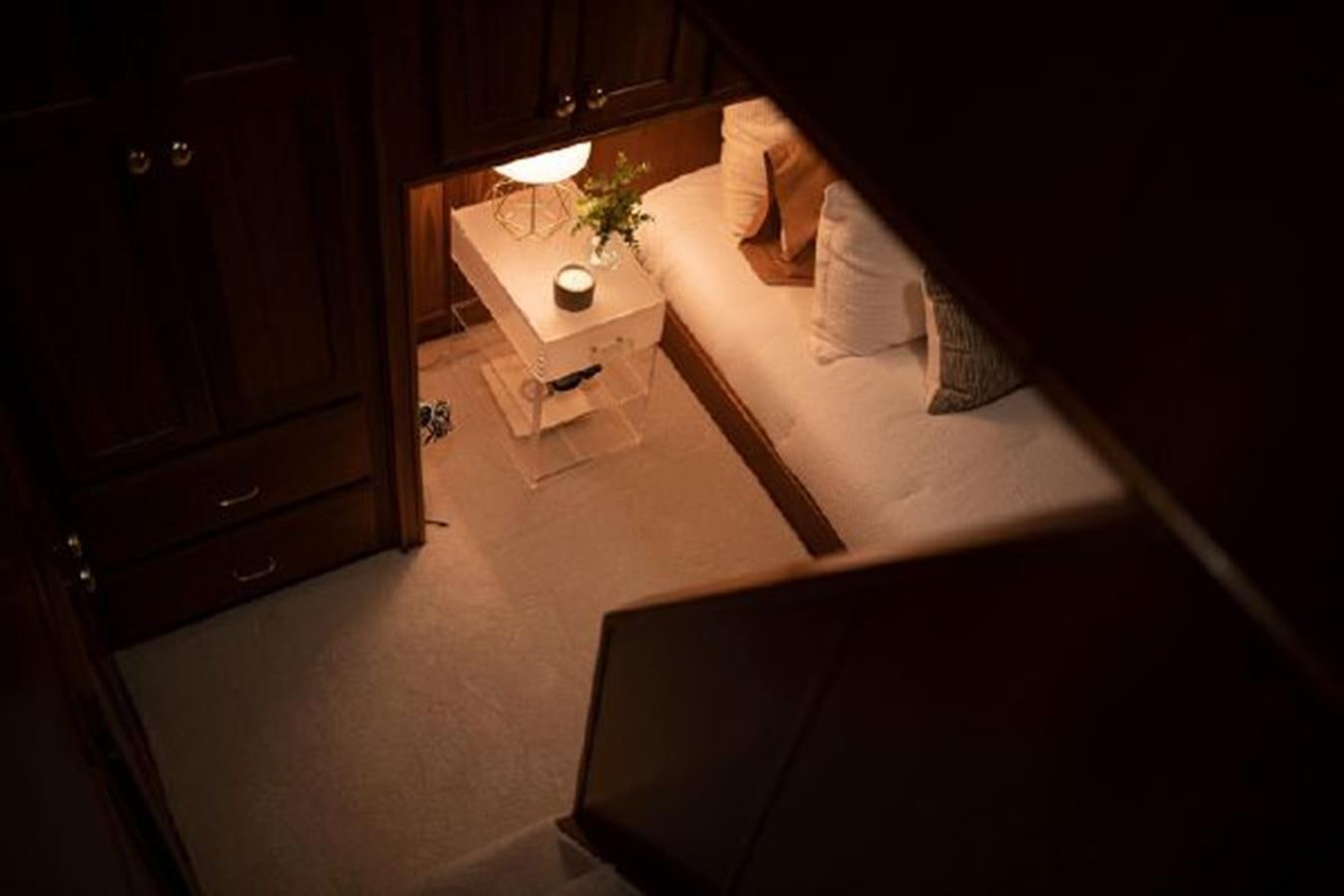 a bed in a room aboard 88 LAZY DAYS BEACHEM Yacht for Sale