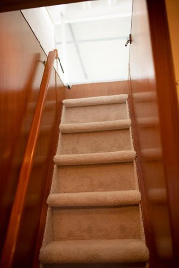 a staircase with a light aboard 88 LAZY DAYS BEACHEM Yacht for Sale