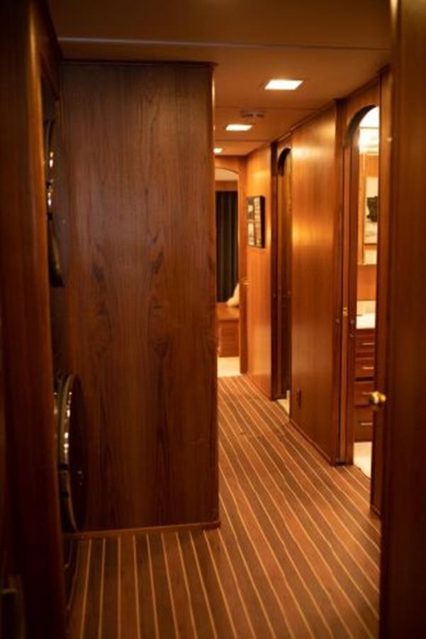 a hallway with wooden doors aboard 88 LAZY DAYS BEACHEM Yacht for Sale