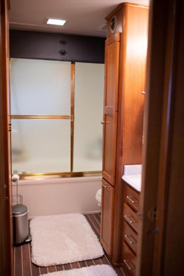 a bathroom with a tub and sink aboard 88 LAZY DAYS BEACHEM Yacht for Sale