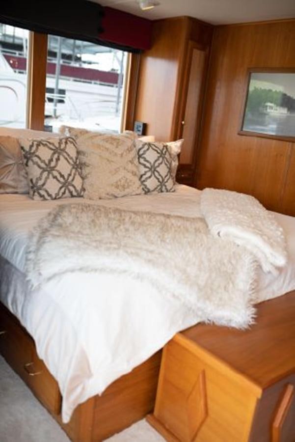 a bed with pillows aboard 88 LAZY DAYS BEACHEM Yacht for Sale