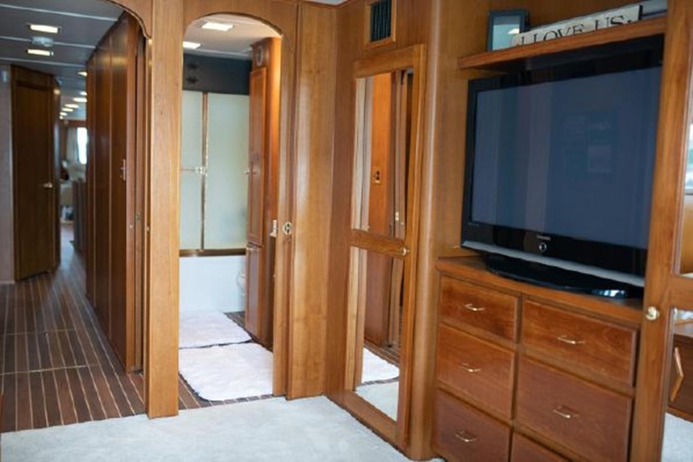 a room with a tv and a cabinet aboard 88 LAZY DAYS BEACHEM Yacht for Sale