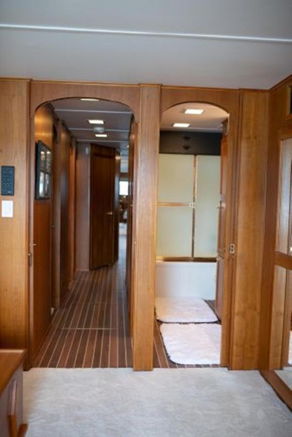 a hallway with doors aboard 88 LAZY DAYS BEACHEM Yacht for Sale