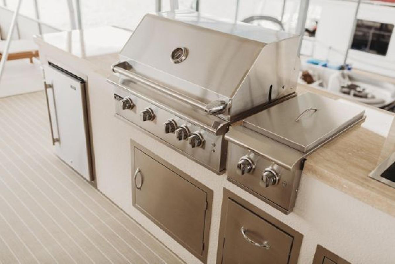a kitchen with a stainless steel stove aboard 88 LAZY DAYS BEACHEM Yacht for Sale
