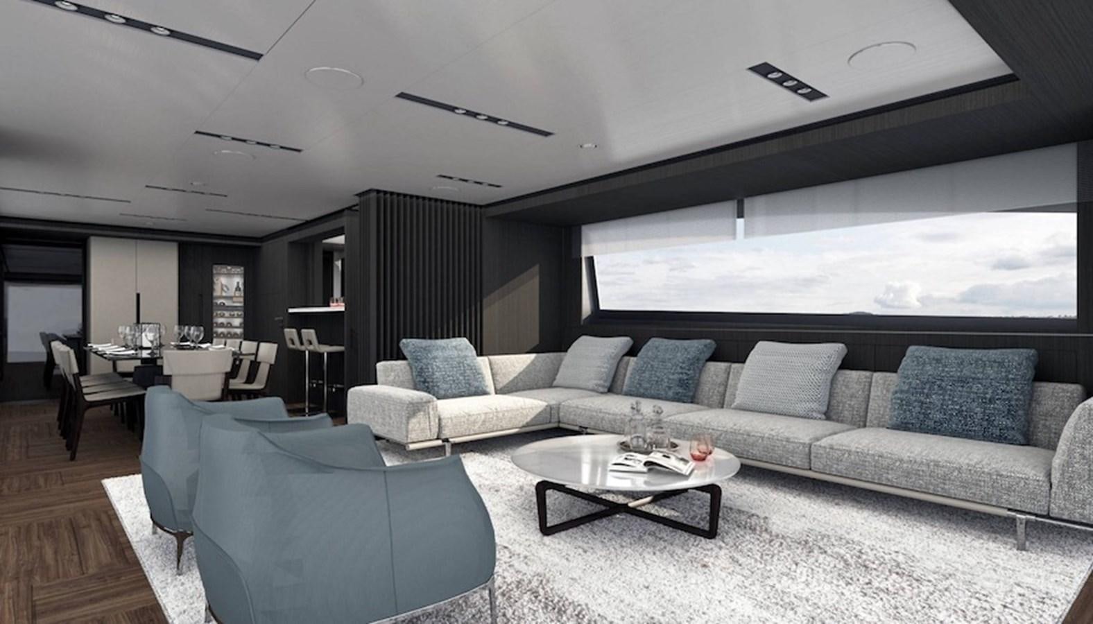 a living room with a couch and a coffee table aboard PERSHING GTX 116 Yacht for Sale