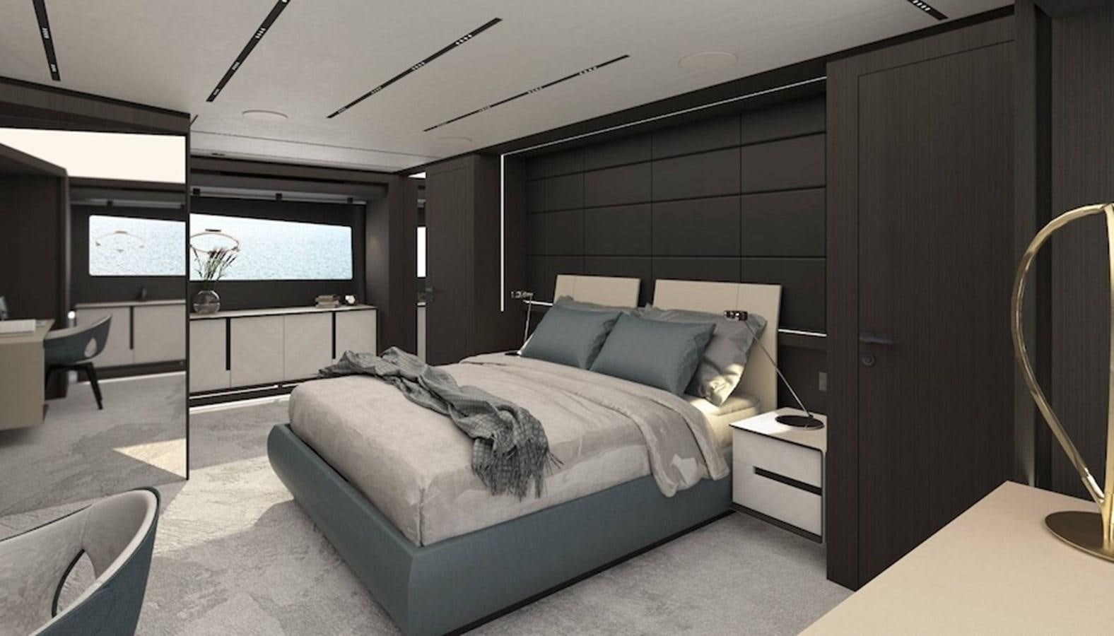 a bedroom with a bed and a desk aboard PERSHING GTX 116 Yacht for Sale