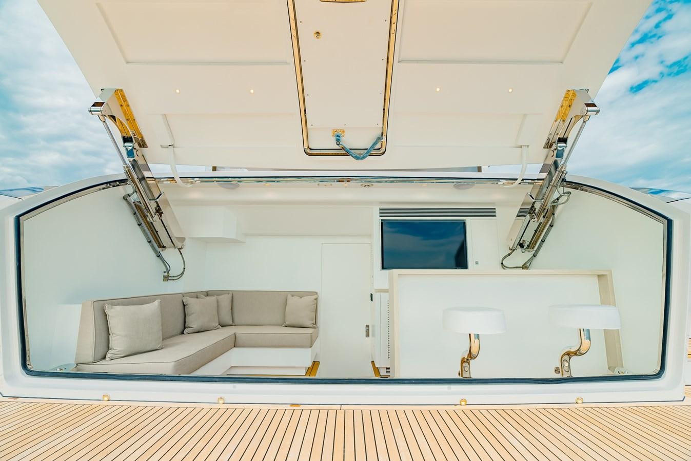 a white boat with a ladder aboard HORIZON FD110 Yacht for Sale