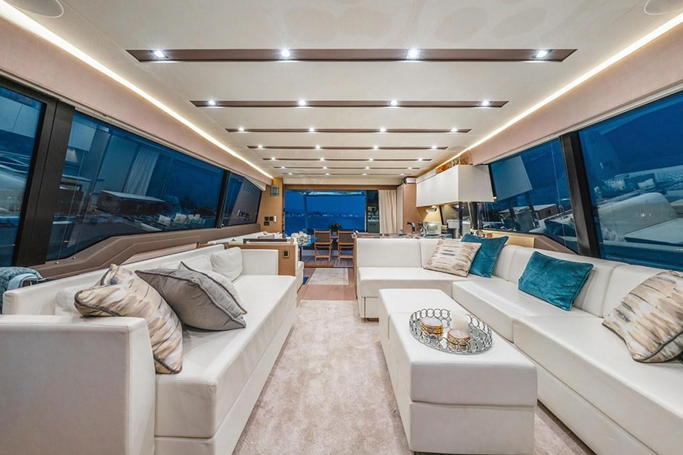 a room with a bed and a large window aboard 2018 PRESTIGE 680 Yacht for Sale