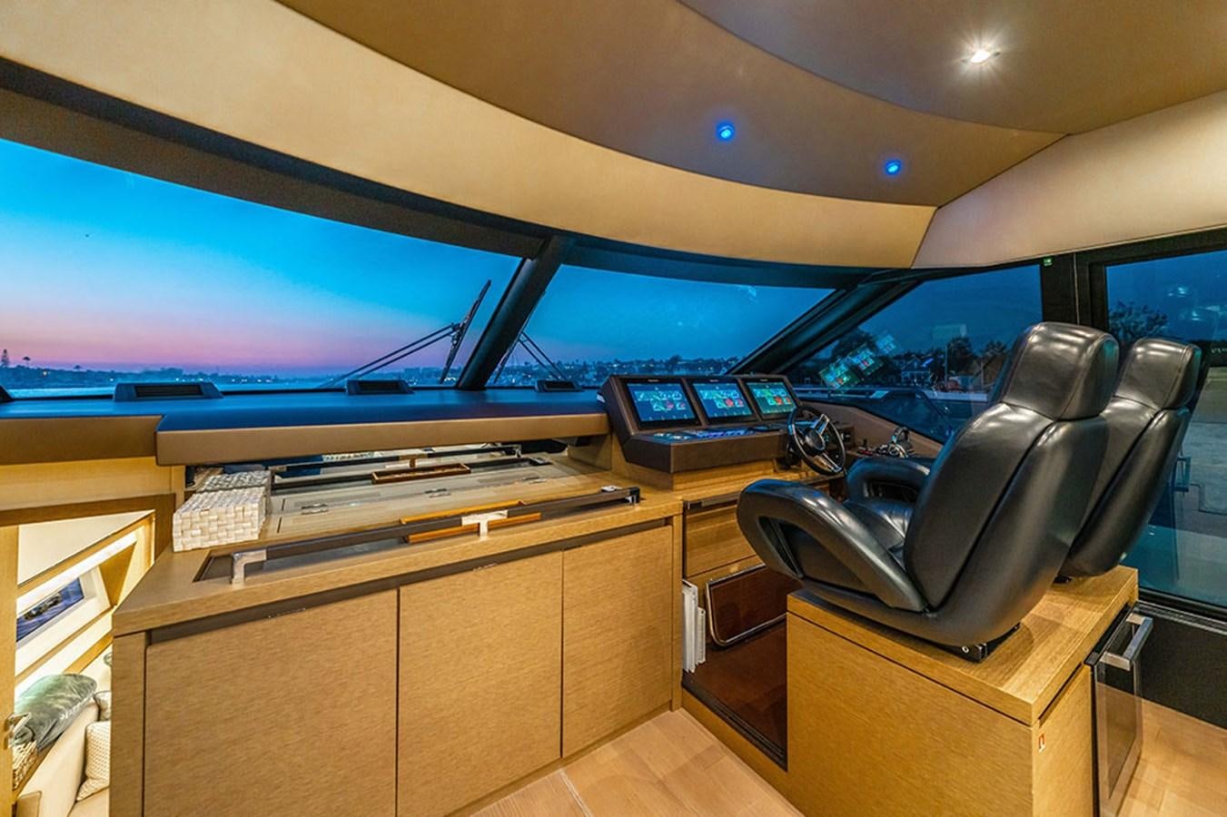 a room with a desk and computer aboard 2018 PRESTIGE 680 Yacht for Sale