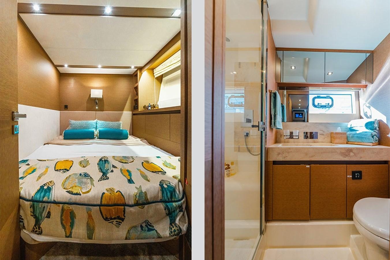 a small bedroom with a bed aboard 2018 PRESTIGE 680 Yacht for Sale