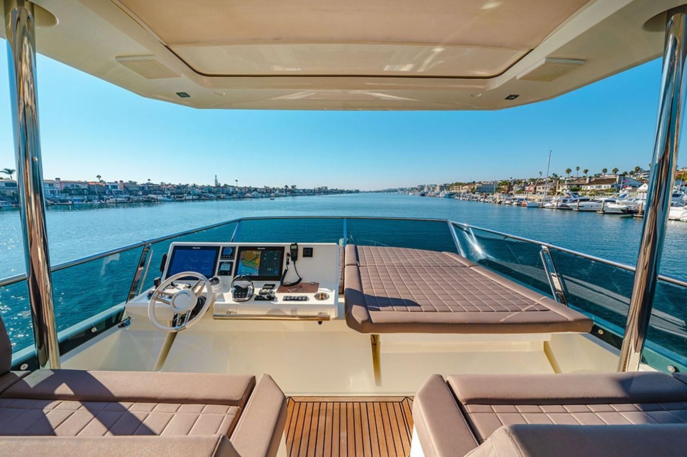 a deck with a boat on it aboard 2018 PRESTIGE 680 Yacht for Sale