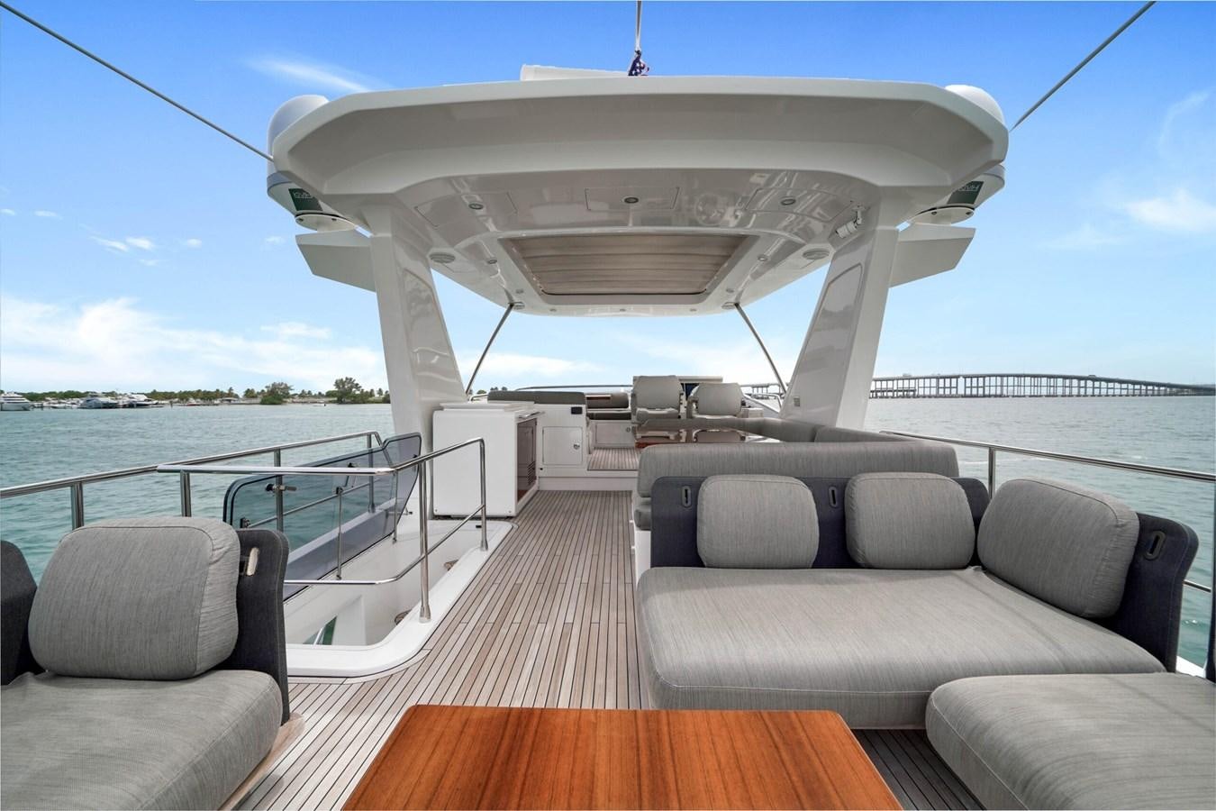 a boat on a water body aboard 2017 66' AZIMUT Yacht for Sale